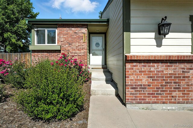 5317 S Truckee Ct, Centennial, CO 80015 - property entrance featuring brick siding