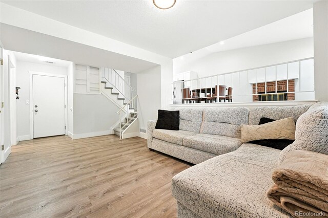 5317 S Truckee Ct, Centennial, CO 80015 - living area featuring light wood-style flooring and stairway