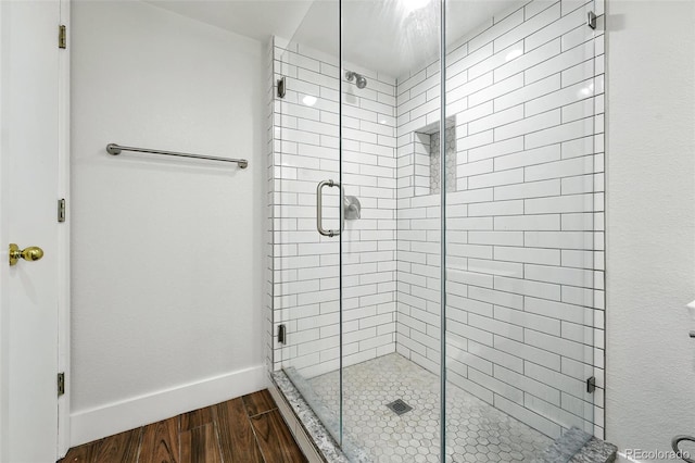 5317 S Truckee Ct, Centennial, CO 80015 - full bathroom with wood finished floors and a shower stall
