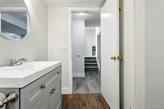 5317 S Truckee Ct, Centennial, CO 80015 - bathroom featuring wood finished floors and vanity