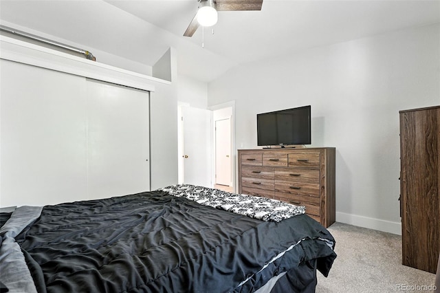 5317 S Truckee Ct, Centennial, CO 80015 - bedroom featuring light colored carpet, lofted ceiling, a closet, and a ceiling fan