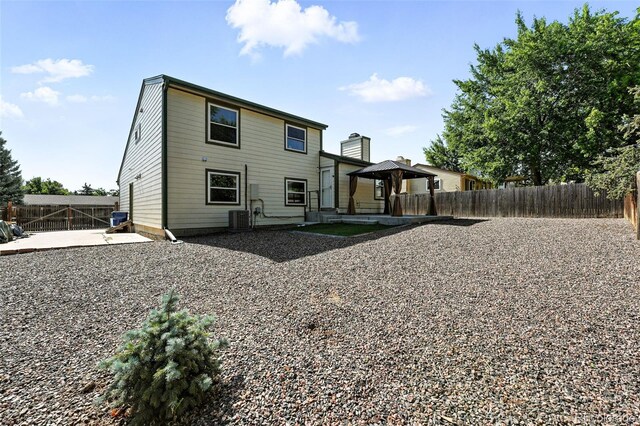 5317 S Truckee Ct, Centennial, CO 80015 - back of property featuring a patio, a gazebo, and a fenced backyard