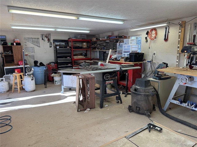 garage featuring a workshop area