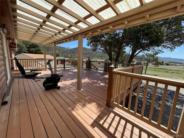 163 Holiday Hills Blvd, Howard, CO 81233 - deck with a mountain view and a pergola