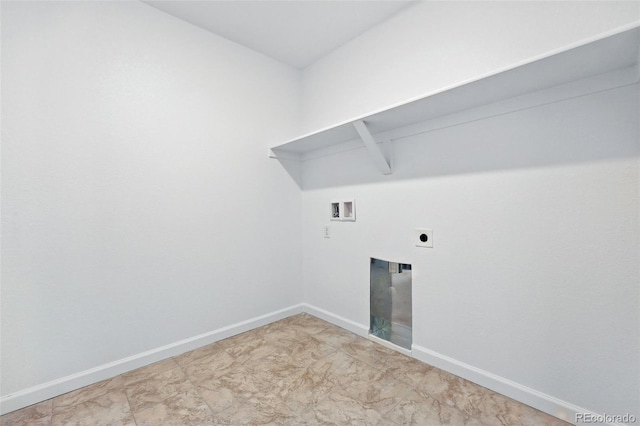laundry area featuring baseboards, electric dryer hookup, laundry area, and washer hookup