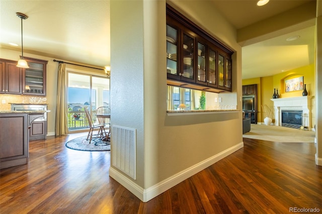 27565 E Nova Pl, Aurora, CO 80016 - hallway with dark wood-style floors and recessed lighting