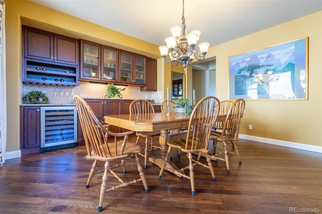 27565 E Nova Pl, Aurora, CO 80016 - dining area with wine cooler, a chandelier, dark wood-style floors, and a bar