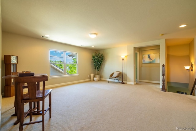 27565 E Nova Pl, Aurora, CO 80016 - sitting room featuring carpet, recessed lighting, and an upstairs landing