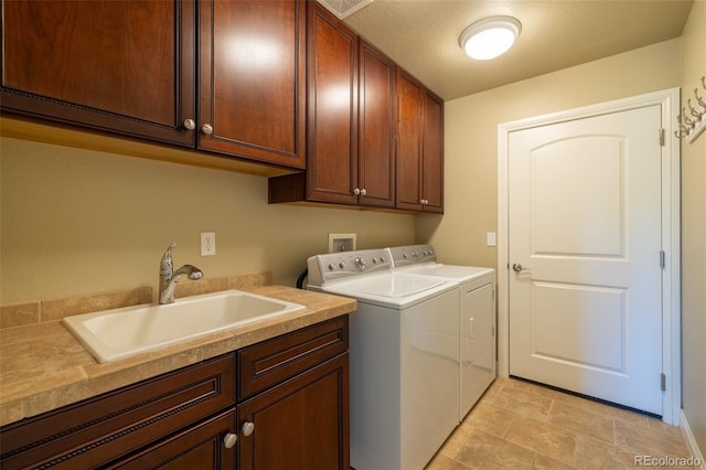 27565 E Nova Pl, Aurora, CO 80016 - laundry room featuring cabinet space and washing machine and dryer