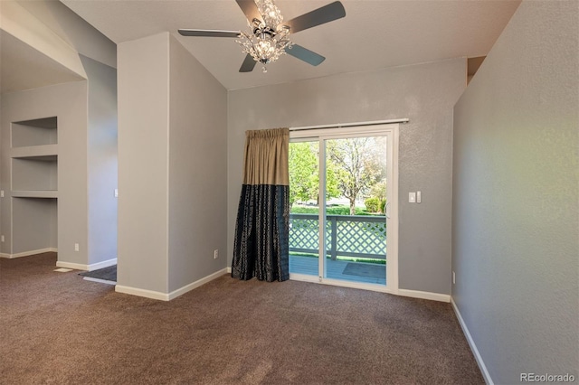 spare room with ceiling fan, carpet flooring, and baseboards