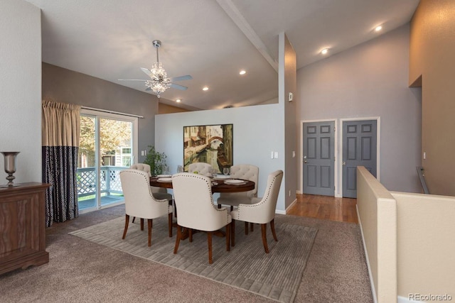 carpeted dining area with lofted ceiling, ceiling fan, and recessed lighting
