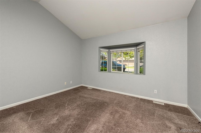 9025 W 79th Way Unit D, Arvada, CO 80005 - unfurnished room with dark carpet and vaulted ceiling