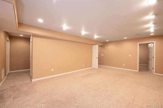 9025 W 79th Way Unit D, Arvada, CO 80005 - finished basement featuring light colored carpet and recessed lighting