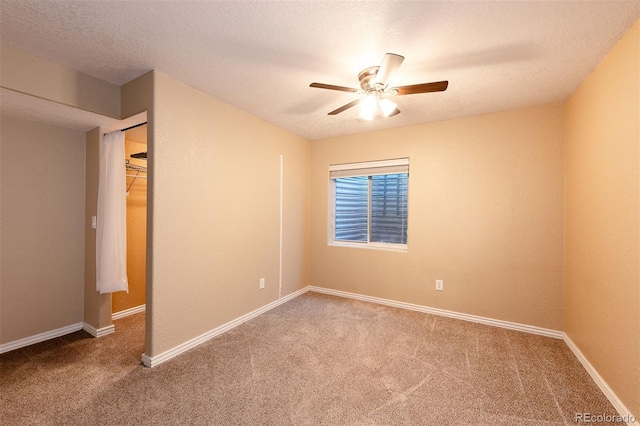 9025 W 79th Way Unit D, Arvada, CO 80005 - carpeted spare room with ceiling fan and a textured ceiling