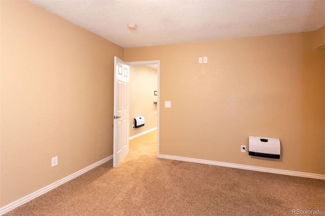 9025 W 79th Way Unit D, Arvada, CO 80005 - spare room with light colored carpet, a smoke detector, and a textured ceiling
