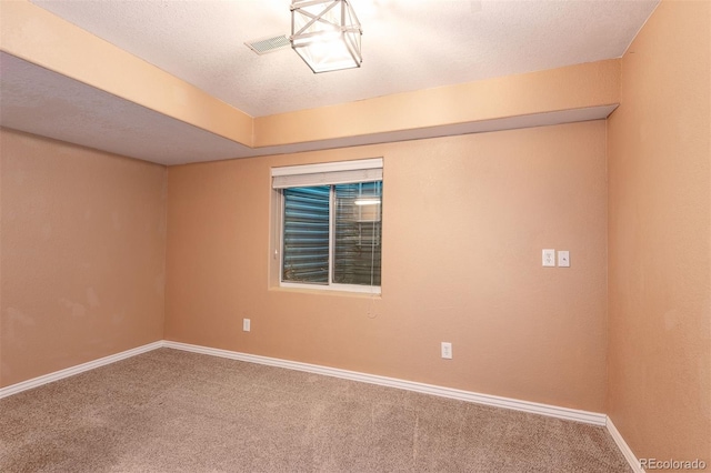 9025 W 79th Way Unit D, Arvada, CO 80005 - carpeted empty room with baseboards and a textured ceiling