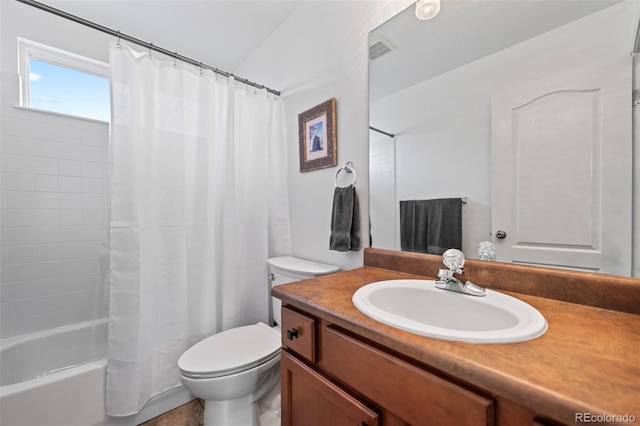 full bathroom with vanity, toilet, shower / bath combo with shower curtain, and vaulted ceiling