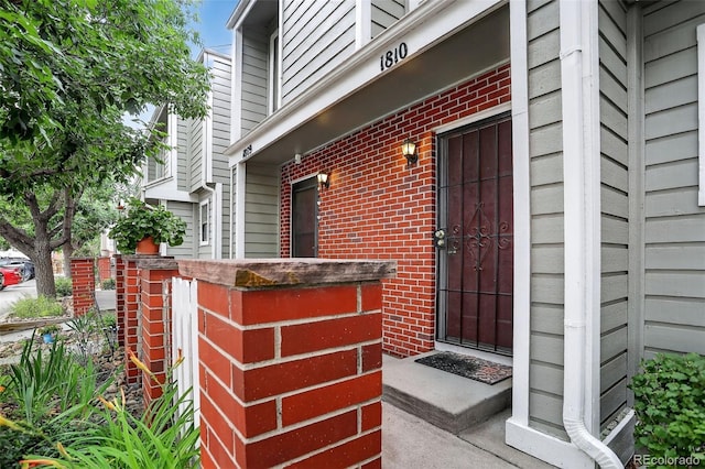 7474 E Arkansas Ave Unit 18-10, Denver, CO 80231 - property entrance featuring brick siding
