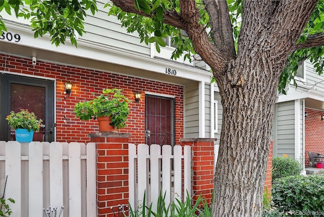 7474 E Arkansas Ave Unit 18-10, Denver, CO 80231 - view of exterior entry with brick siding