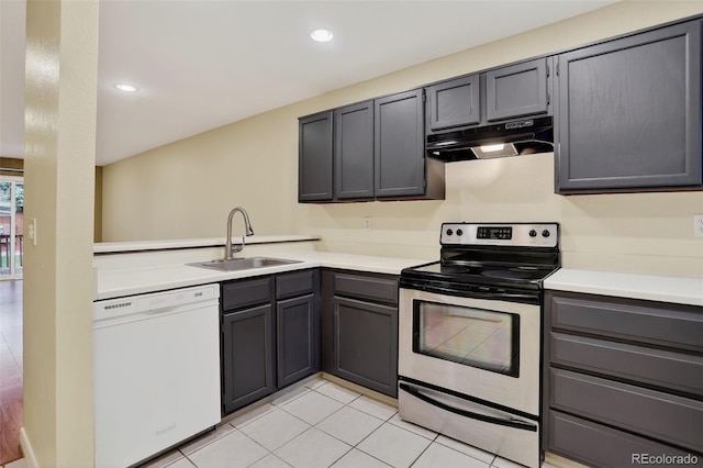 7474 E Arkansas Ave Unit 18-10, Denver, CO 80231 - kitchen with white dishwasher, under cabinet range hood, stainless steel range with electric stovetop, gray cabinets, and recessed lighting