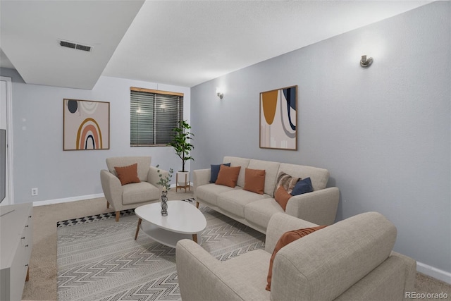 7474 E Arkansas Ave Unit 18-10, Denver, CO 80231 - living area featuring light colored carpet and baseboards
