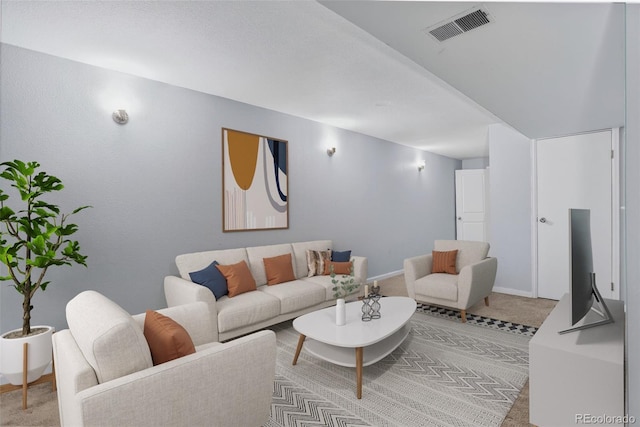 7474 E Arkansas Ave Unit 18-10, Denver, CO 80231 - living room with light colored carpet and baseboards