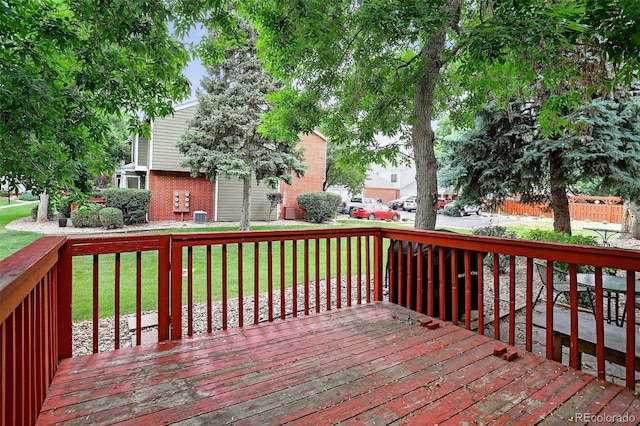 7474 E Arkansas Ave Unit 18-10, Denver, CO 80231 - wooden terrace with a lawn