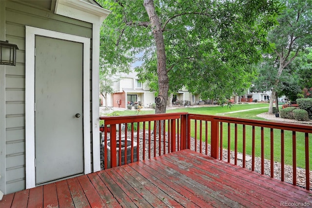 7474 E Arkansas Ave Unit 18-10, Denver, CO 80231 - wooden deck with a yard