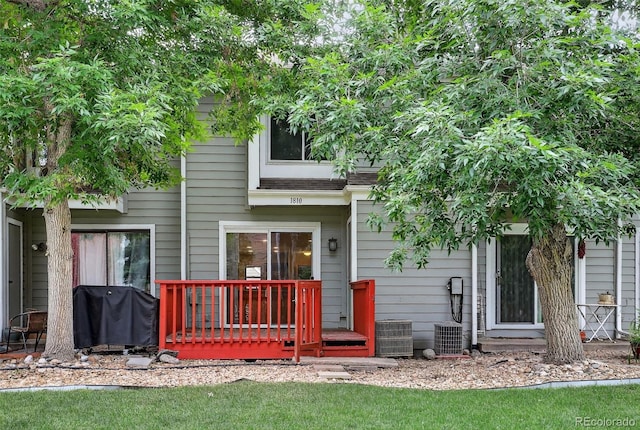 7474 E Arkansas Ave Unit 18-10, Denver, CO 80231 - rear view of house featuring a wooden deck