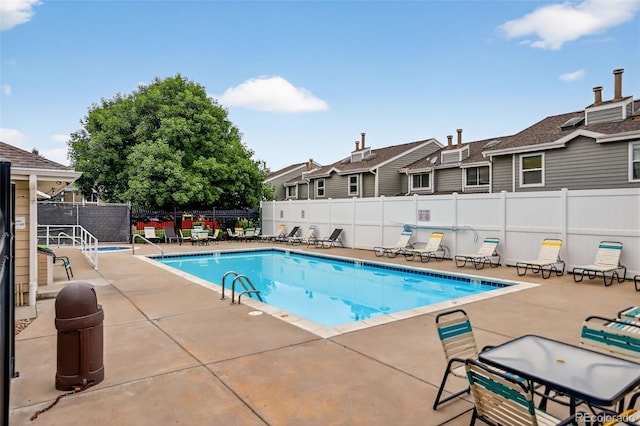 7474 E Arkansas Ave Unit 18-10, Denver, CO 80231 - community pool with a patio and a residential view