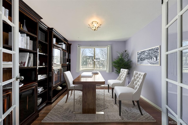 office area with french doors and dark hardwood / wood-style flooring