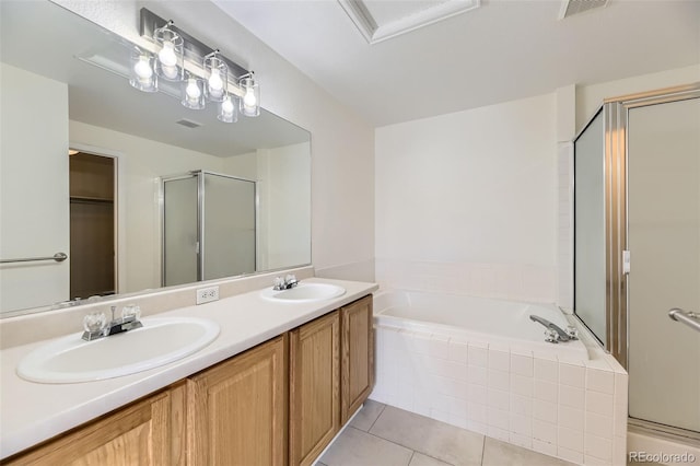 bathroom featuring tile patterned floors, vanity, and independent shower and bath