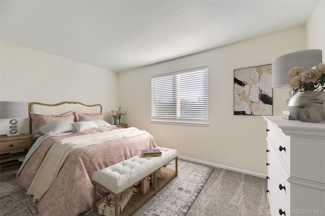 bedroom with light carpet