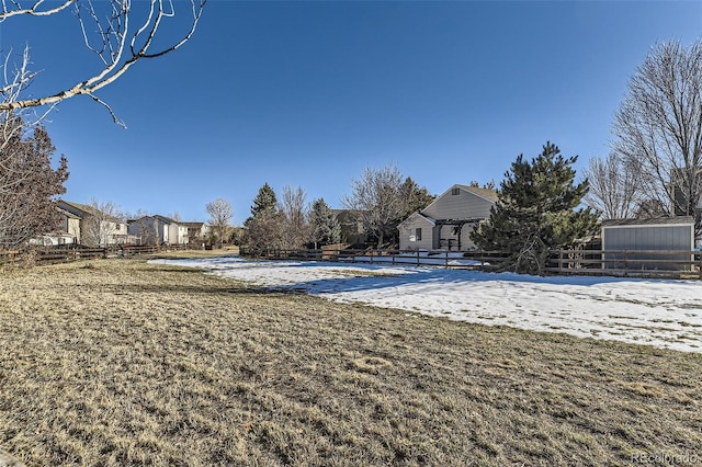 view of yard covered in snow