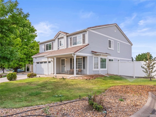 4906 Perth St, Denver, CO 80249 - traditional-style house with an attached garage, a porch, and a tile roof