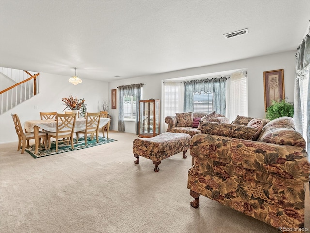 4906 Perth St, Denver, CO 80249 - living area featuring carpet and stairway