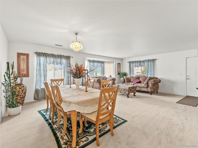 4906 Perth St, Denver, CO 80249 - dining area with light carpet
