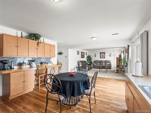 4906 Perth St, Denver, CO 80249 - dining area with light wood-type flooring