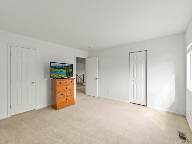 4906 Perth St, Denver, CO 80249 - unfurnished bedroom with light colored carpet and a closet