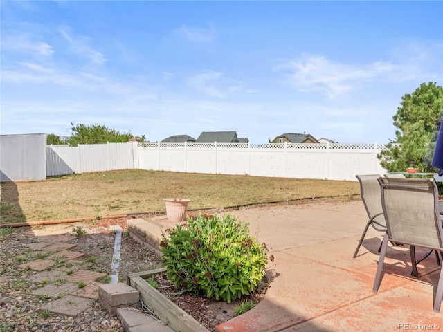 4906 Perth St, Denver, CO 80249 - fenced backyard featuring a patio area