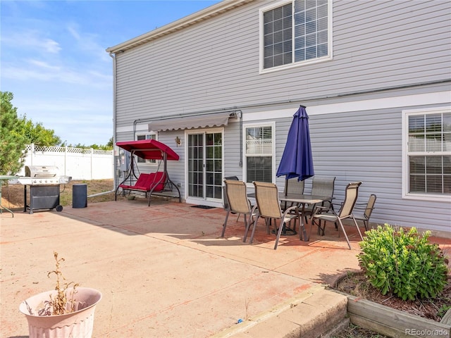 4906 Perth St, Denver, CO 80249 - view of patio / terrace with grilling area and outdoor dining space