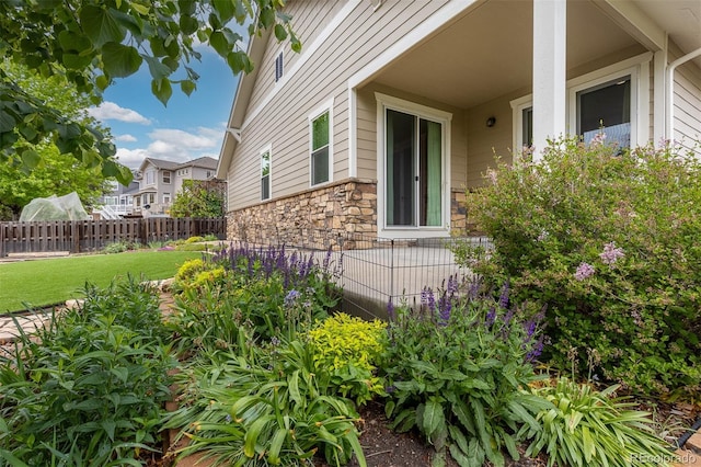 6520 S Newcastle Way, Aurora, CO 80016 - view of property exterior featuring stone siding