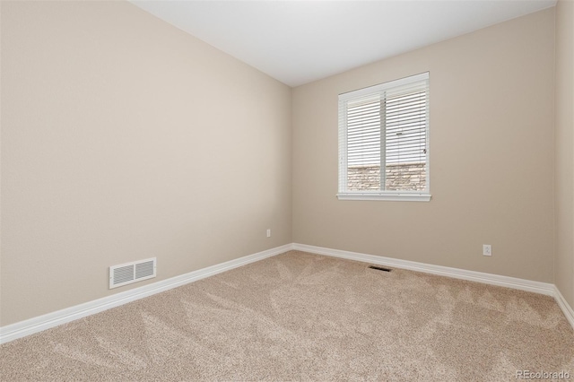 6520 S Newcastle Way, Aurora, CO 80016 - empty room featuring carpet floors and baseboards