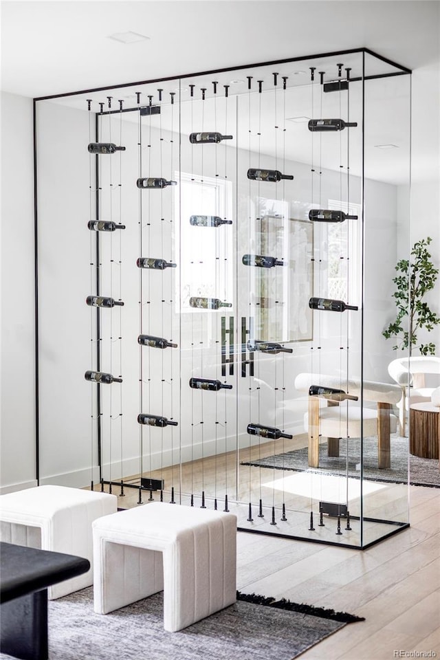 wine cellar with wood finished floors