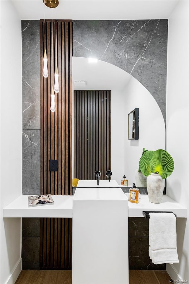 bathroom with wood finished floors
