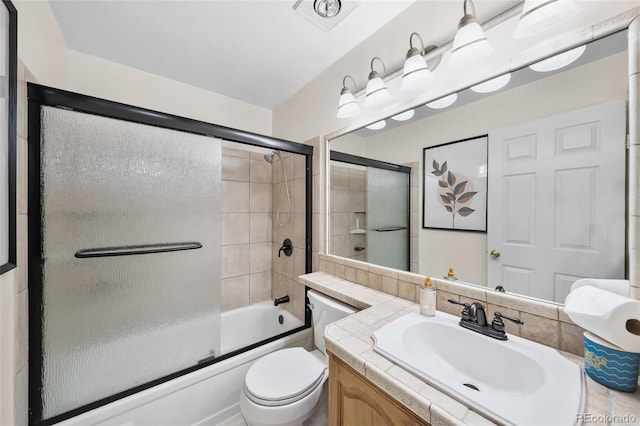 16563 E Kansas Pl, Aurora, CO 80017 - bathroom featuring vanity and enclosed tub / shower combo