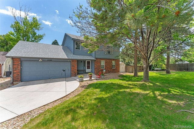 4390 S Sheridan Blvd, Littleton, CO 80123 - view of front facade featuring an attached garage, driveway, brick siding, and a shingled roof