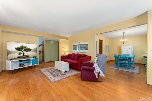 4390 S Sheridan Blvd, Littleton, CO 80123 - living room with a chandelier and wood finished floors