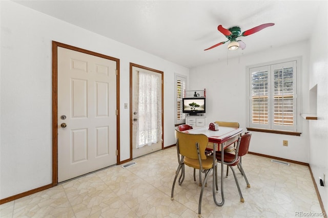 4390 S Sheridan Blvd, Littleton, CO 80123 - dining space with a ceiling fan and baseboards
