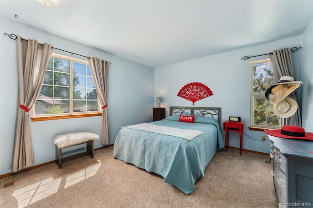 4390 S Sheridan Blvd, Littleton, CO 80123 - carpeted bedroom with baseboards